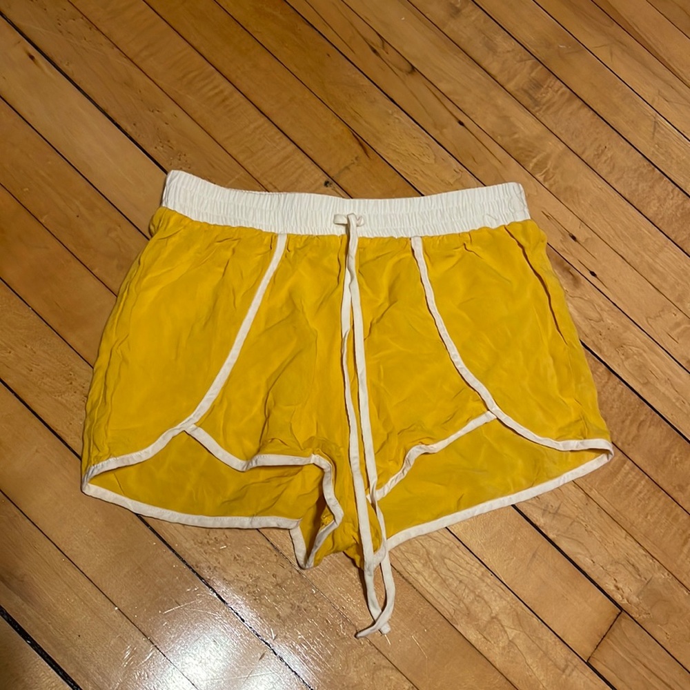 Yellow running mini shorts